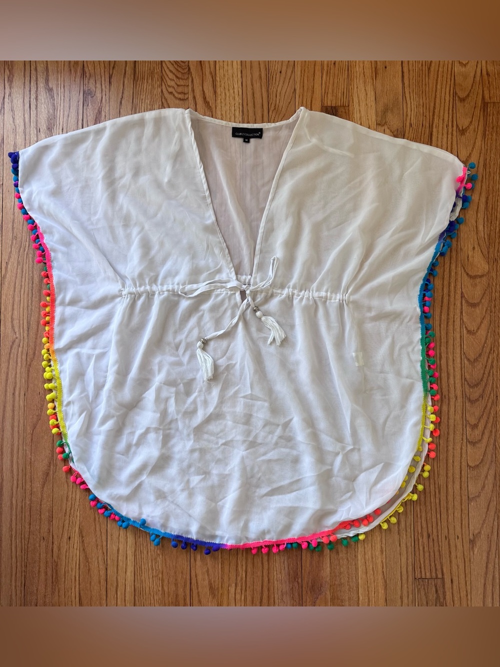 Poncho-style swimsuit cover-up detailed with vibrant rainbow pom-pom trim / M